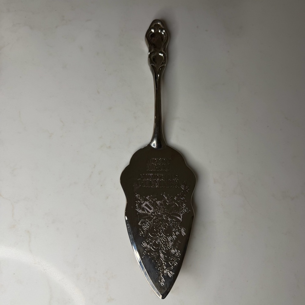 Vintage International company cake trowel-   “ merry Christmas “.  Silver plated